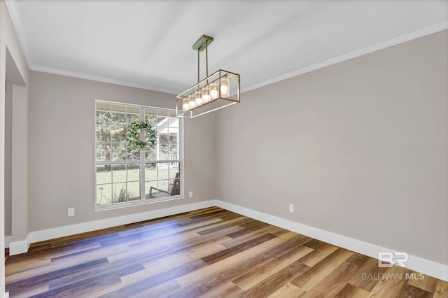 106 Gordon Cir, Daphne, AL 36526 - unfurnished room featuring a chandelier, crown molding, and wood finished floors
