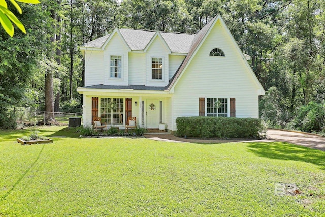 106 Gordon Cir, Daphne, AL 36526 - view of front of house featuring a shingled roof and view of scattered trees