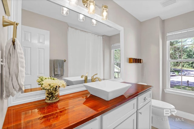 106 Gordon Cir, Daphne, AL 36526 - bathroom with vanity and tile patterned flooring