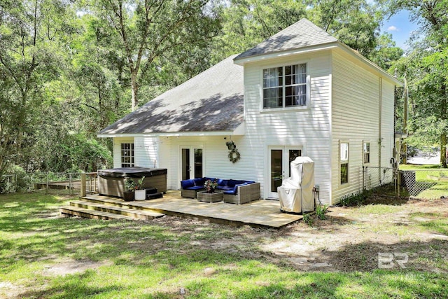 106 Gordon Cir, Daphne, AL 36526 - rear view of property featuring a hot tub, a deck, an outdoor hangout area, and roof with shingles