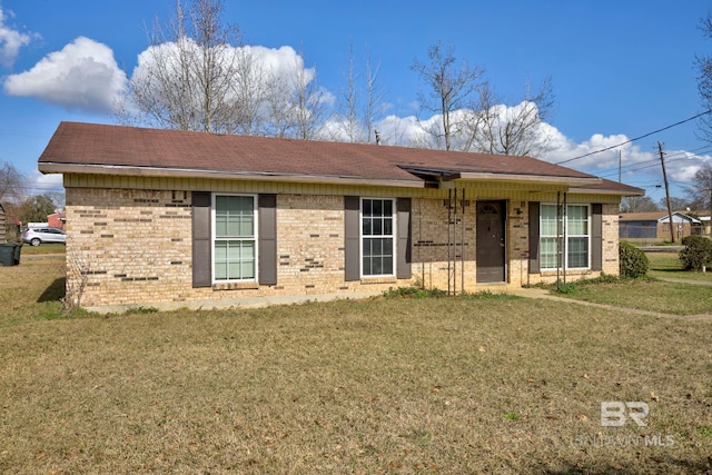 single story home with a front yard