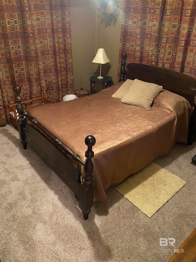 bedroom featuring carpet flooring