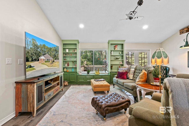 living room with dark hardwood / wood-style flooring, vaulted ceiling, and ceiling fan