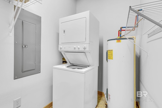 laundry room with stacked washer and dryer, water heater, laundry area, electric panel, and baseboards