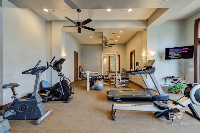 exercise room with baseboards, a ceiling fan, and recessed lighting