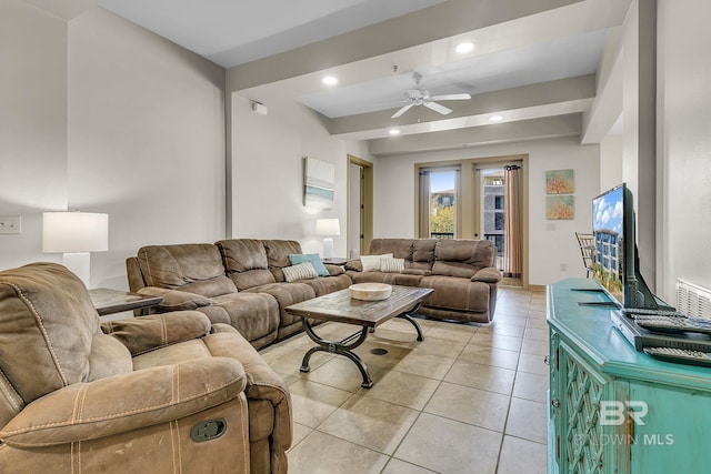 living room with a ceiling fan, recessed lighting, and light tile patterned floors