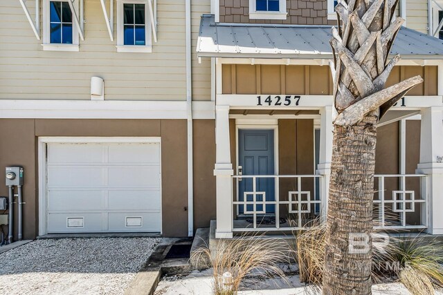 entrance to property featuring a garage