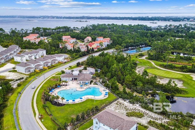 birds eye view of property featuring a water view