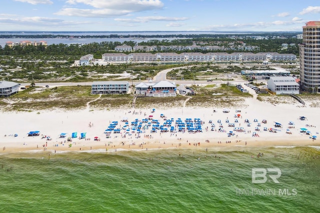 bird's eye view featuring a beach view and a water view