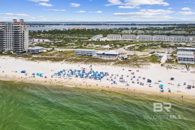 bird's eye view featuring a beach view and a water view