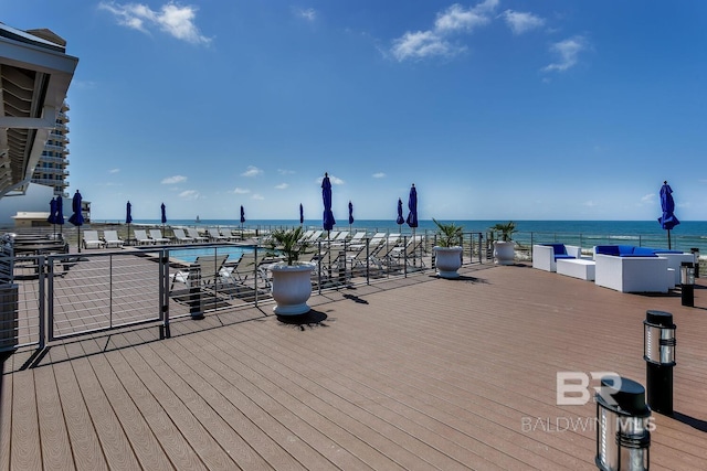 wooden deck with a water view