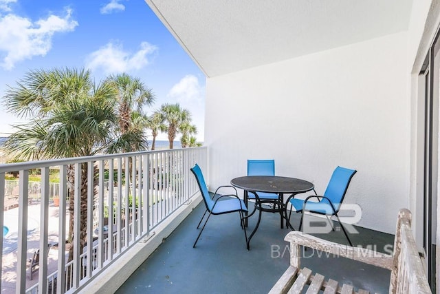 balcony with outdoor dining area