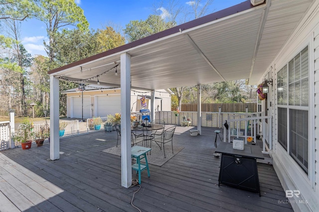 deck with a storage shed