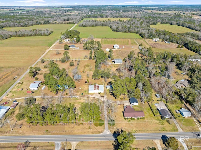 birds eye view of property featuring a rural view