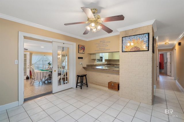 interior space featuring sink, ceiling fan, french doors, and crown molding