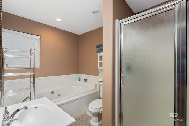 full bathroom with shower with separate bathtub, toilet, tile flooring, and sink