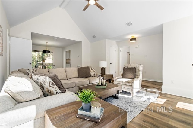 living room with beam ceiling, high vaulted ceiling, light hardwood / wood-style flooring, and ceiling fan