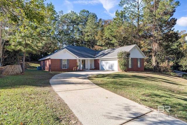 ranch-style home featuring a front yard and a garage