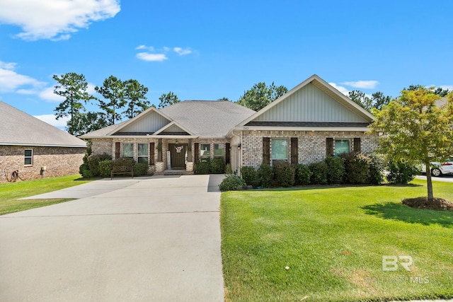 craftsman inspired home with a front lawn and brick siding