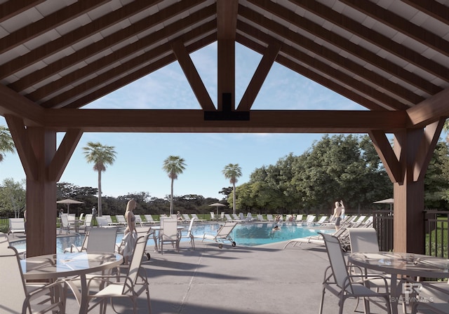 view of patio / terrace featuring a community pool