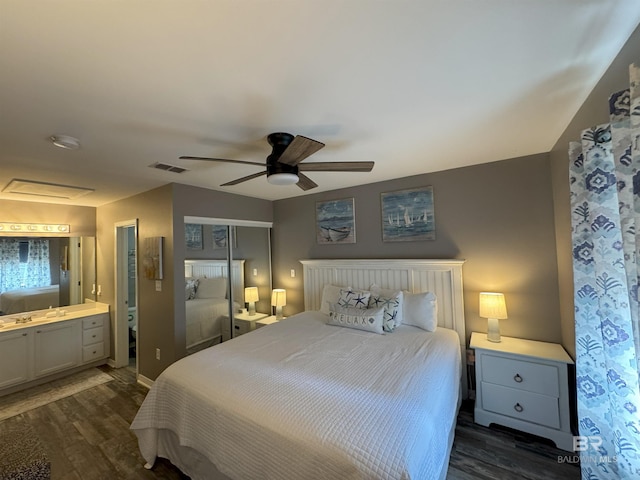1117 W Lagoon Ave Unit 9, Gulf Shores, AL 36542 - bedroom with dark wood-type flooring, a closet, ensuite bath, and a ceiling fan