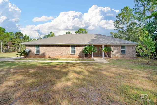 ranch-style home with a front lawn