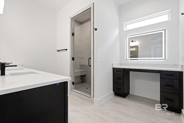 bathroom with vanity and an enclosed shower