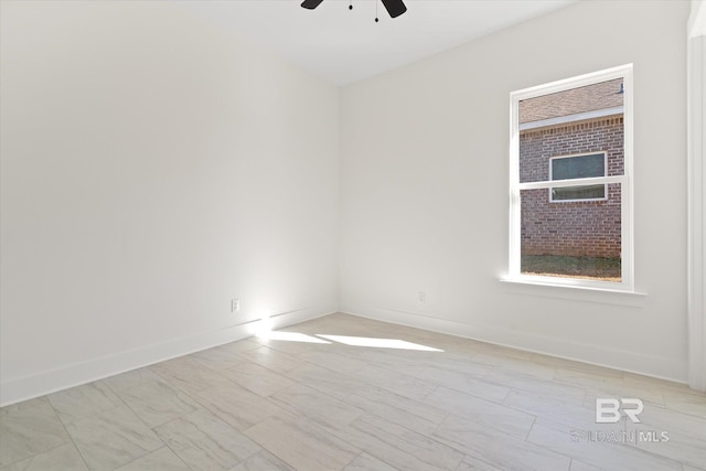 unfurnished room with ceiling fan