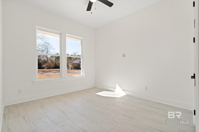 spare room featuring ceiling fan