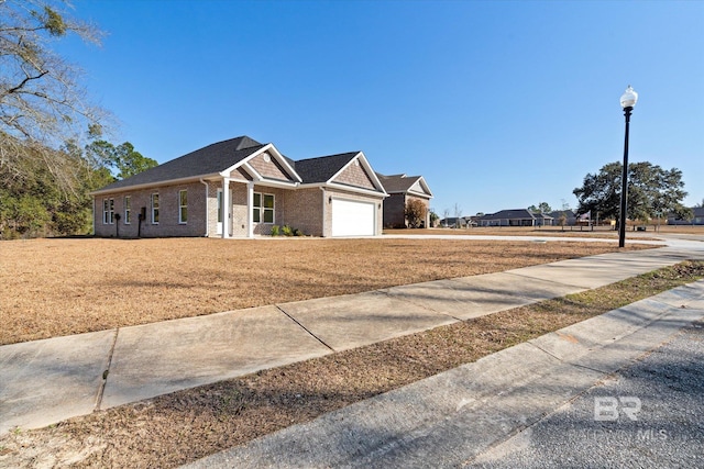 ranch-style home with a garage