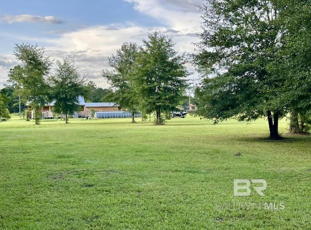 24996 Cowpen Creek Rd, Robertsdale, AL 36567 - view of grassy yard