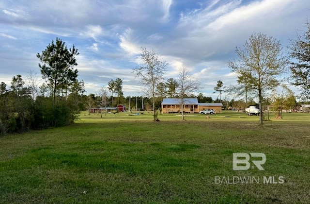 24996 Cowpen Creek Rd, Robertsdale, AL 36567 - view of community featuring a yard
