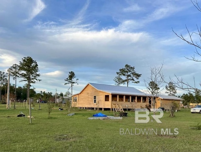24996 Cowpen Creek Rd, Robertsdale, AL 36567 - back of property featuring a yard