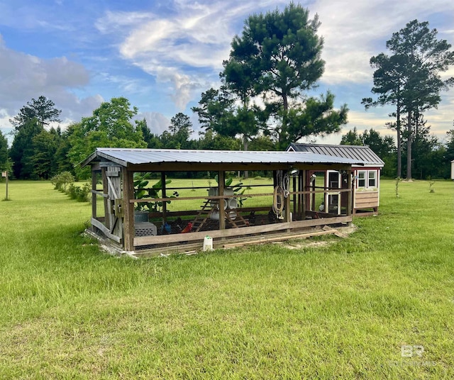 24996 Cowpen Creek Rd, Robertsdale, AL 36567 - view of property's community with exterior structure, an outbuilding, and a lawn