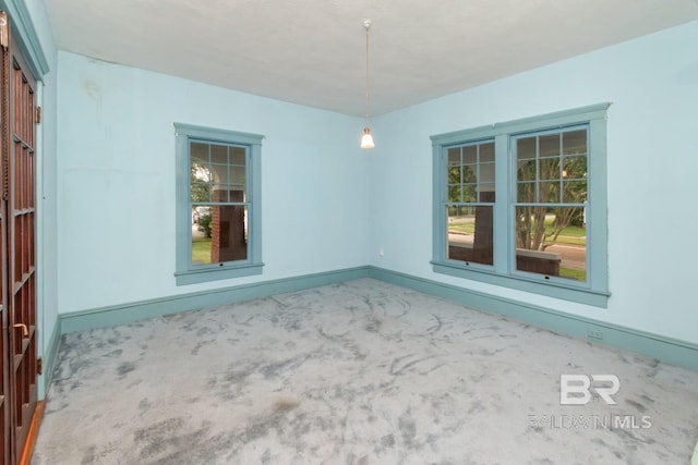 101 S Carlen St, Mobile, AL 36606 - unfurnished room featuring carpet and plenty of natural light