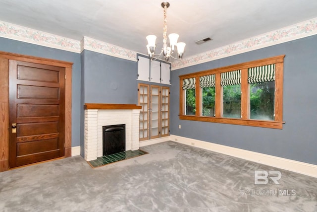 101 S Carlen St, Mobile, AL 36606 - unfurnished living room with a chandelier, carpet flooring, and a fireplace