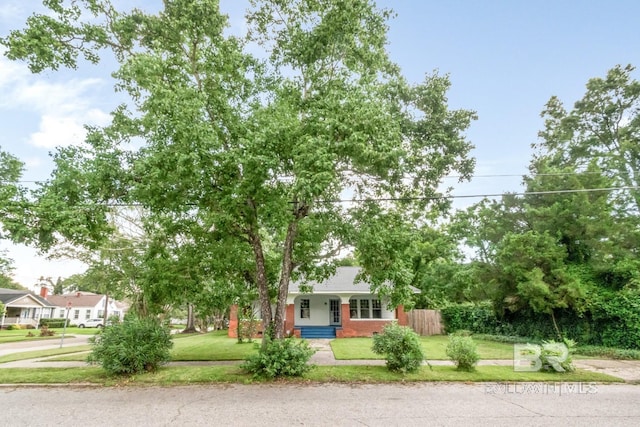 101 S Carlen St, Mobile, AL 36606 - obstructed view of property featuring a porch