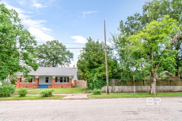 101 S Carlen St, Mobile, AL 36606 - view of front facade with brick siding and a chimney