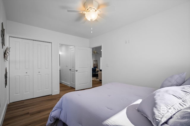 bedroom with a closet, ceiling fan, and dark hardwood / wood-style flooring