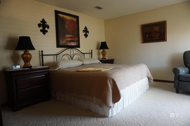 bedroom with light carpet