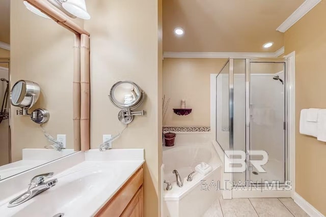 bathroom with plus walk in shower, vanity, tile floors, and ornamental molding