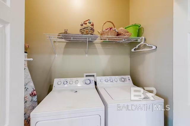 laundry area featuring washer hookup and washer and dryer