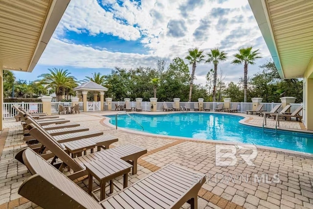 view of pool featuring a patio area