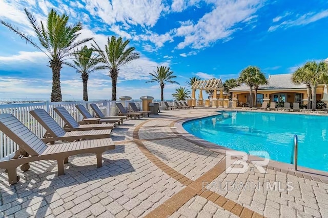 view of pool with a patio