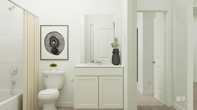 bathroom featuring vanity, toilet, baseboards, and shower / tub combo