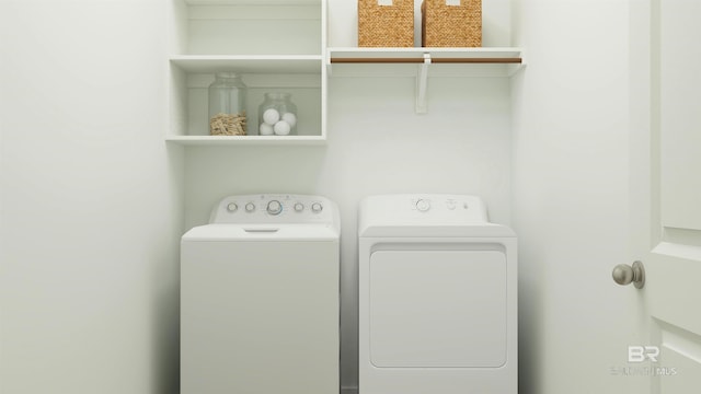 clothes washing area featuring laundry area and independent washer and dryer