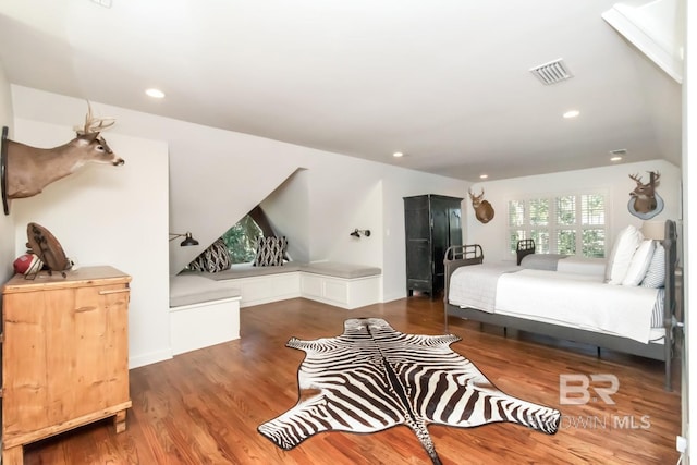 bedroom featuring dark hardwood / wood-style floors