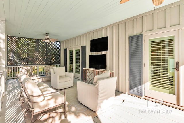 view of patio featuring an outdoor living space and ceiling fan