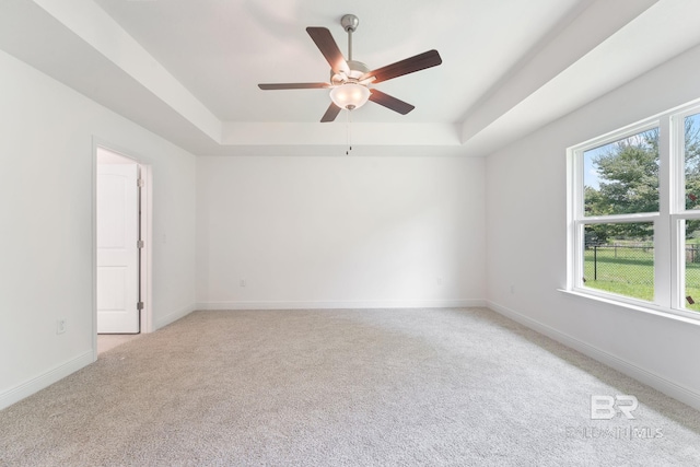 1819 Mary Jane Dr, Bay Minette, AL 36507 - spare room with ceiling fan, light colored carpet, baseboards, and a raised ceiling