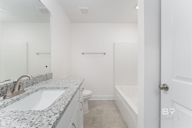 1819 Mary Jane Dr, Bay Minette, AL 36507 - bathroom with baseboards, vanity, toilet, and visible vents